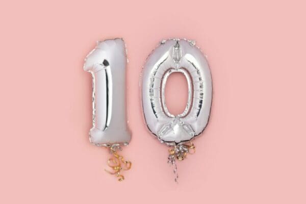 Silver Number ten Balloons on pink background