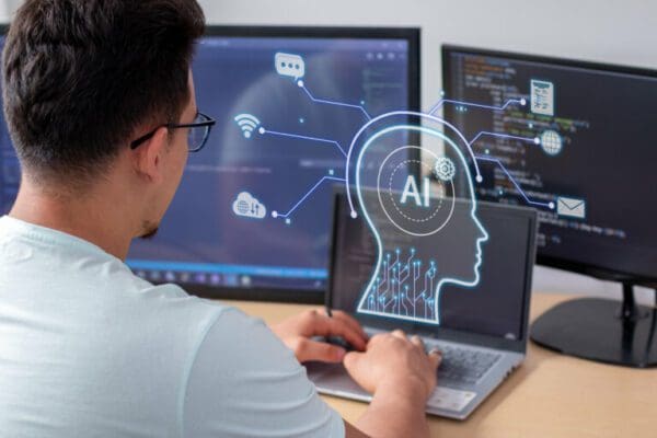 Businessesman using Deep Learning AI Technology on laptop