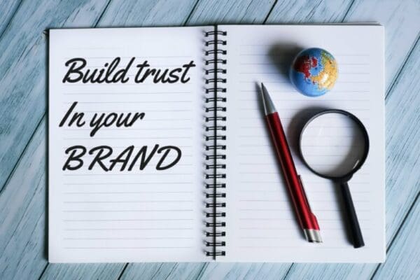 notebook written build trust in your brand and office tools
