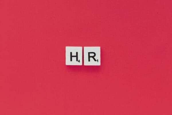 HR word on a pink background