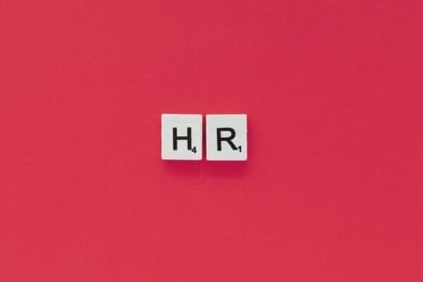 HR word on a pink background