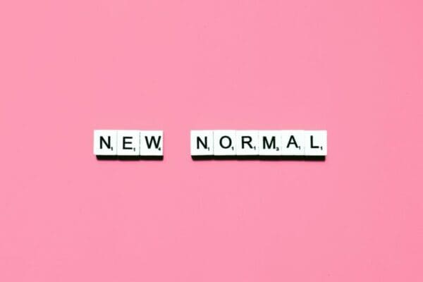 NEW NORMAL on pink background