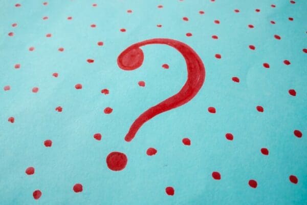 Red Question mark on blue background